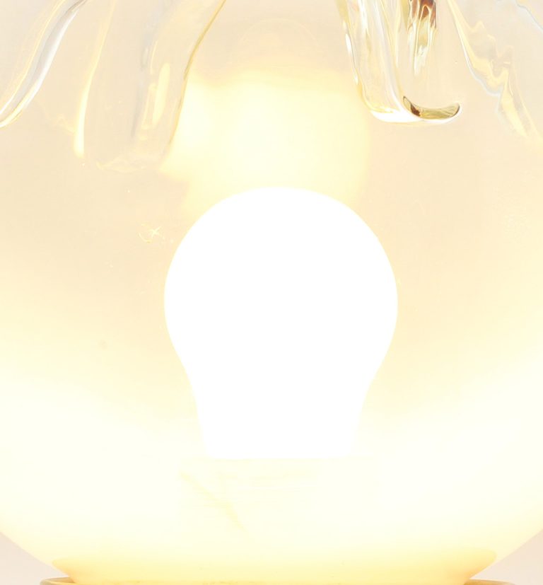 Bright light bulb glowing intensely