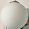 White spherical pendant light fixture.
